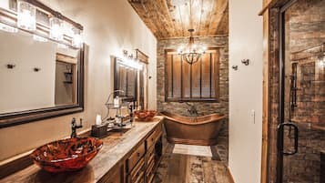 Bathtub, hair dryer, towels, soap