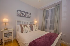 1 chambre, fer et planche à repasser, Wi-Fi gratuit, draps fournis