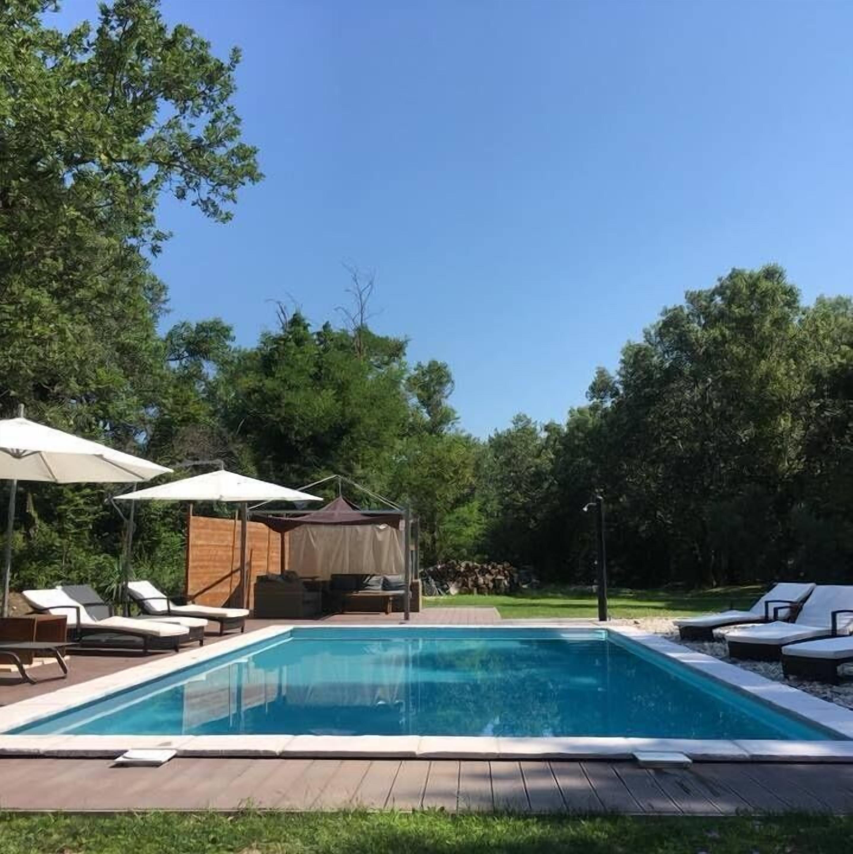 Seasonal outdoor pool, pool umbrellas, pool loungers