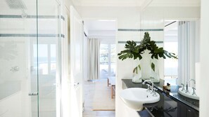 Bathtub, hair dryer, towels