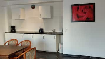 Fridge, stovetop, cookware/dishes/utensils