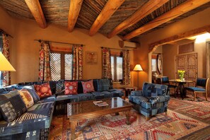 Room (Adobe Rose) | Living area | 43-inch LED TV with cable channels, TV, fireplace - The Inn of The Five Graces (Santa Fe)