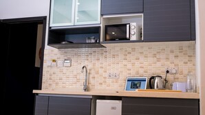Apartment, Non Smoking, City View | Private kitchen | Fridge, microwave, oven, stovetop - Seedspace Dar es Salaam (Dar es Salaam)