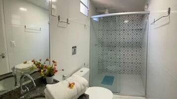 Shower, towels, toilet paper