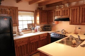 House | Private kitchen | Full-sized fridge, microwave, coffee/tea maker, toaster