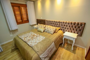 Suite de lujo, 1 cama Queen size, para no fumadores | 1 habitación, camas con pillow-top, minibar y wifi gratis 