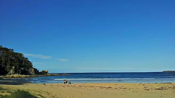 On the beach, beach towels