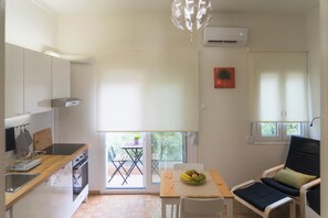 Appartement Ville, 1 lit double et 1 canapé-lit, non-fumeurs, vue ville | Coin séjour | Télévision LCD