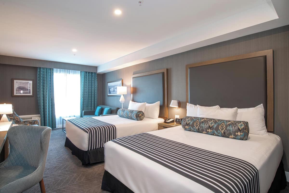 standard room, 2 queen beds, sofa bed | premium bedding, pillow-top beds, minibar, in-room safe