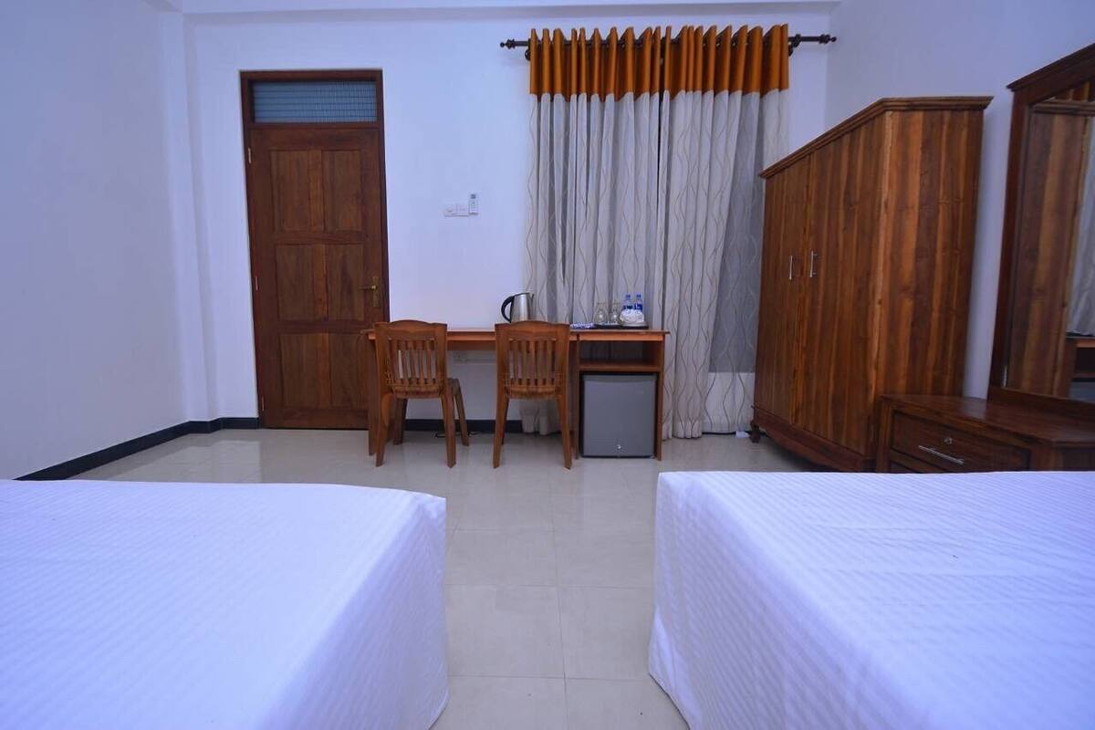 Premium bedding, desk, blackout drapes, iron/ironing board