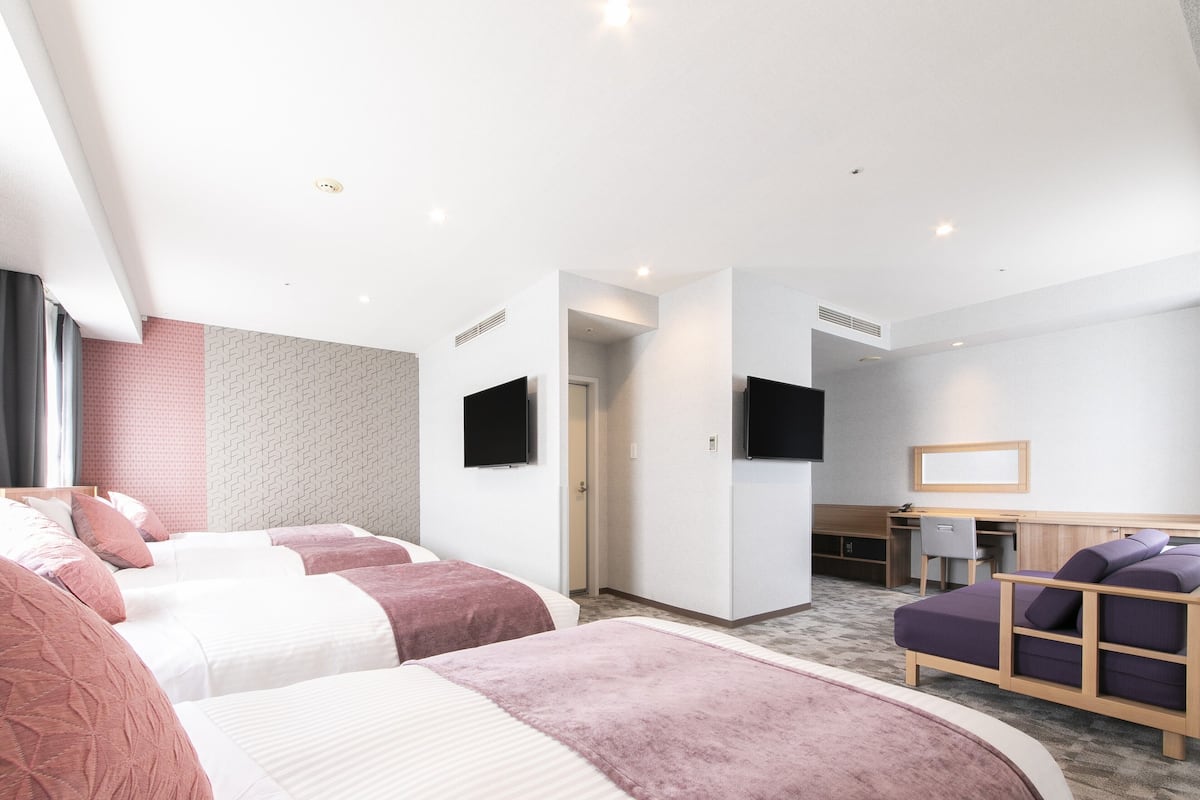 Deluxe Quadruple Room, Non Smoking | Premium bedding, in-room safe, desk, free WiFi