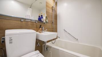 Combined shower/tub, deep soaking tub, free toiletries, hair dryer