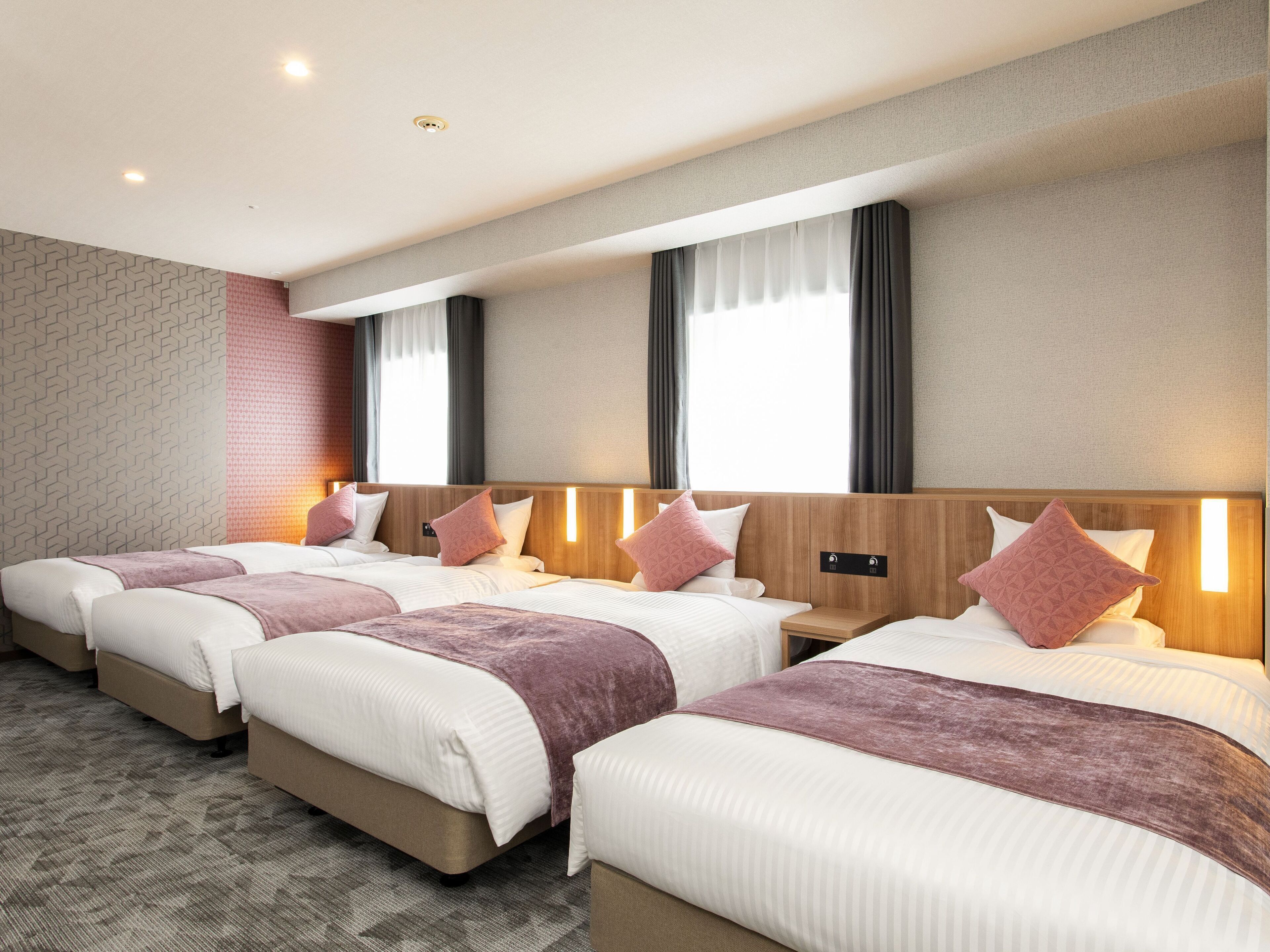 deluxe quadruple room, non smoking | premium bedding, in-room safe, desk, free wifi