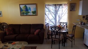 Family House, 2 Bedrooms | Living area | TV - Cozy Getaway In New Harbor village (Old Harbour)
