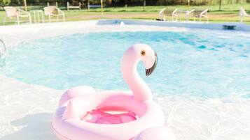 Outdoor pool, open 9:30 AM to 10:00 PM, pool umbrellas, pool loungers
