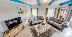 TV, DVD player, books, stereo - 5 star apartment under thatch in a quiet location with a unique view (Pellworm)