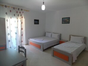 Studio, Sea View | Living area | Flat-screen TV - Guest house Vila Bega (Sarandë)