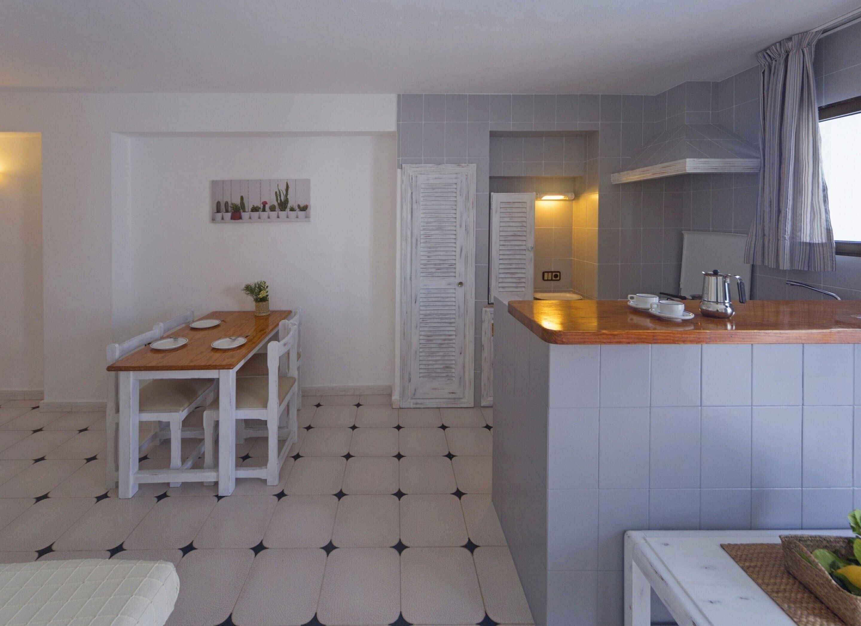 Apartment, 1 Bedroom, Balcony, Pool View | Living area | Flat-screen TV