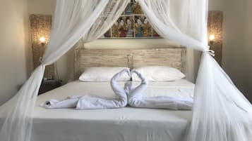 Luxury Bungalow Pool View | Een minibar, een kluis op de kamer, een bureau, gratis babybedden