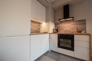 Private kitchen - City Lights Apartments - Rakowicka 15 (Kraków)