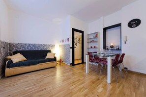 Departamento, 1 habitación | Área de sala de estar