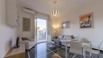 Apartment, 2 Bedrooms, Balcony | Living area | TV
