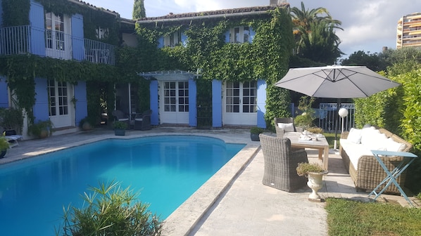 Outdoor pool, pool umbrellas, pool loungers