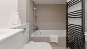 Separate tub and shower, free toiletries
