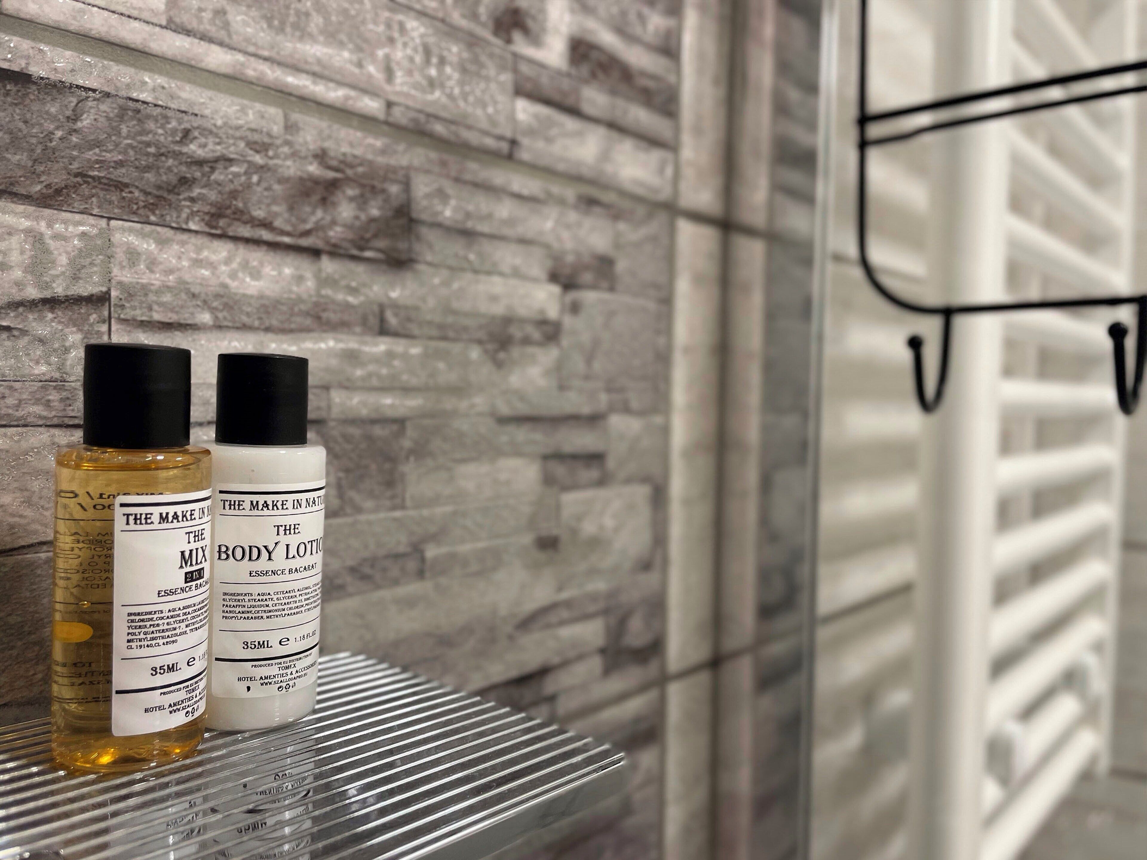 superior apartment | bathroom | hair dryer, towels