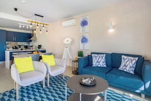 Duplex, 2 Bedrooms, Non Smoking, Garden View | Living area | Flat-screen TV, heated floors
