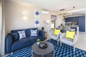 Apartment, 2 Bedrooms, Non Smoking, Garden View | Living area | Flat-screen TV, heated floors