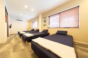 Room for 4 Guests | Desk, laptop workspace, blackout drapes, iron/ironing board - Guest House Megu-chan (Osaka)