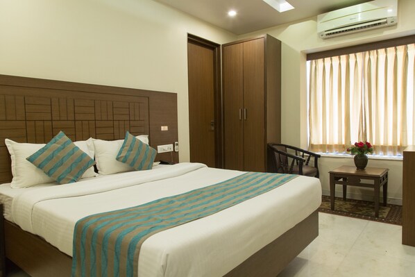 Egyptian cotton sheets, premium bedding, memory-foam beds, minibar