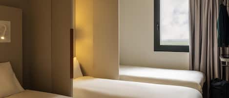Desk, blackout drapes, soundproofing, free cribs/infant beds