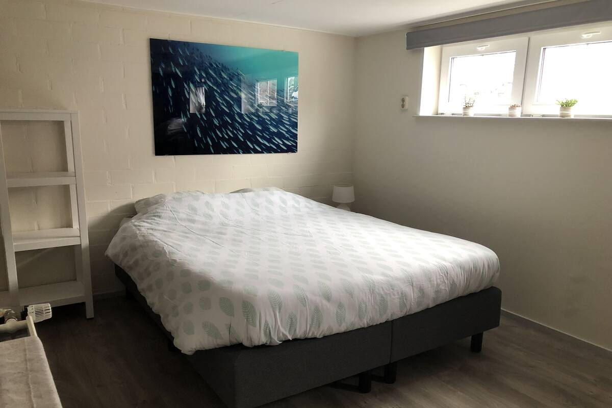 Comfort Apartment | Blackout curtains, iron/ironing board, cots/infant beds, free WiFi