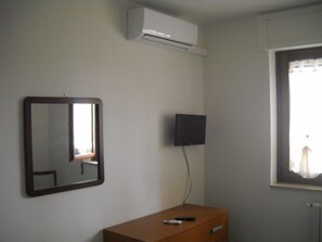 Chambre Double Confort pour 1 personne (Orchidea) | Wi-Fi gratuit, draps fournis