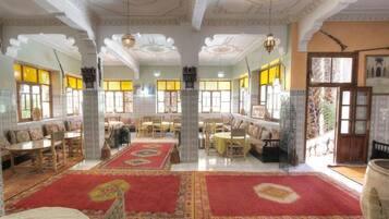 Breakfast, lunch, dinner served; local cuisine