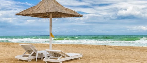 Free beach shuttle, sun loungers, beach umbrellas, beach towels