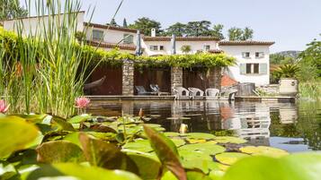 Indoor pool, seasonal outdoor pool, pool umbrellas, pool loungers