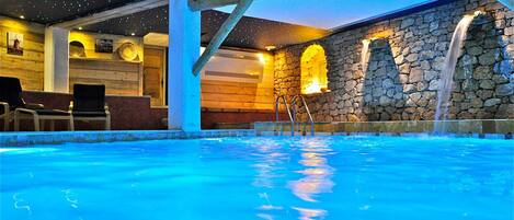 Indoor pool, seasonal outdoor pool, pool umbrellas, pool loungers