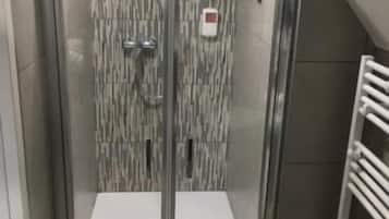 Shower, free toiletries, hair dryer, towels