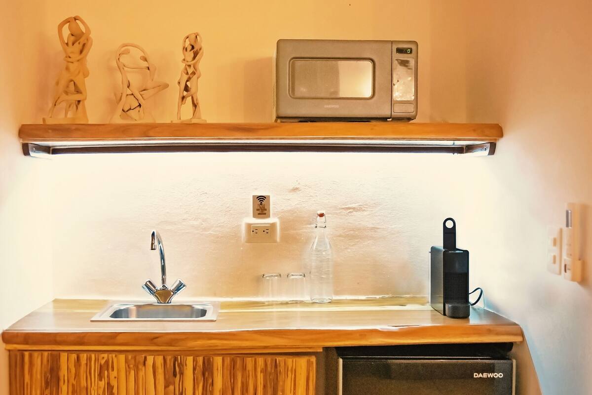 deluxe room, 1 king bed | private kitchen | mini-fridge, microwave