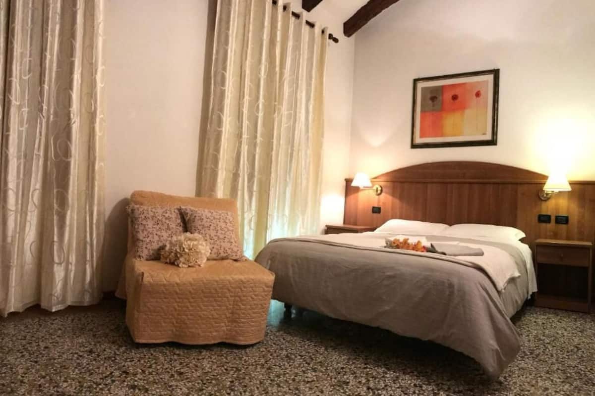Triple Room | Down comforters, in-room safe, desk, soundproofing