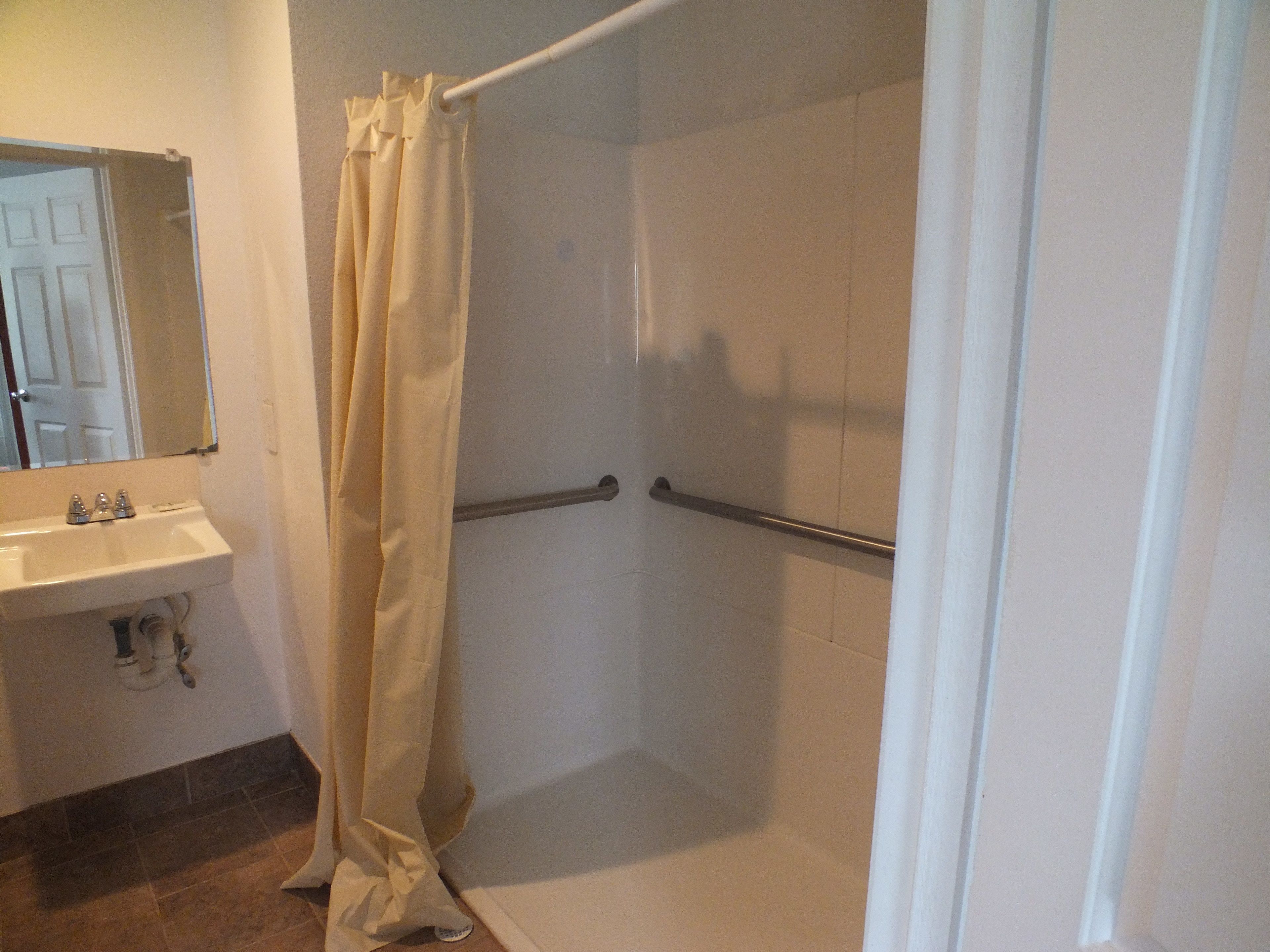 comfort apartment, 1 king bed, non smoking | bathroom shower