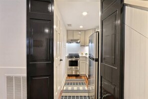 Apartment, 1 King Bed (Isaac LaRoche Garden) | Private kitchen | Microwave, oven, dishwasher, cookware/dishes/utensils - Isaac Laroche Garden (Savannah)