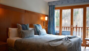 Quarto casal | Cortinas blackout, quartos à prova de som, Wi-Fi de cortesia