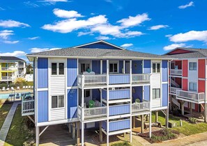 Exterior - Relax in this 2BR condo at Seven Seas, just steps from Holden Beach. (Holden Beach)