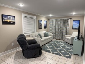 TV - Relax in this 2BR condo at Seven Seas, just steps from Holden Beach. (Holden Beach)