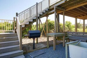 Outdoor dining - Oceanfront 4-bedroom home at Holden Beach, perfect for fun and relaxation. (Holden Beach)