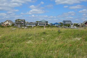 Property grounds - Experience oceanfront living at Dune Deck North, a cozy 4-bedroom duplex in Holden Beach. (Holden Beach)